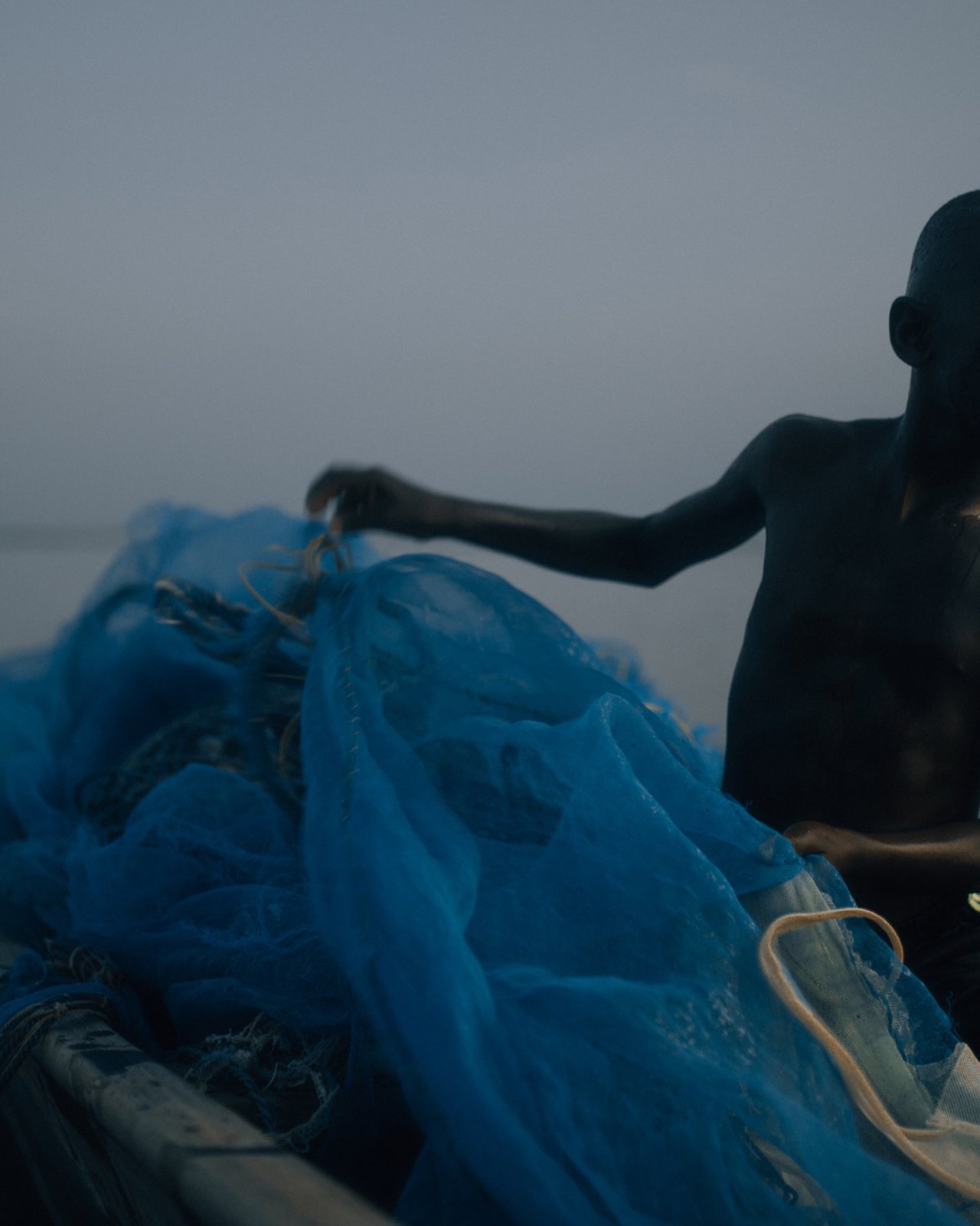 Foli Boat with Boy