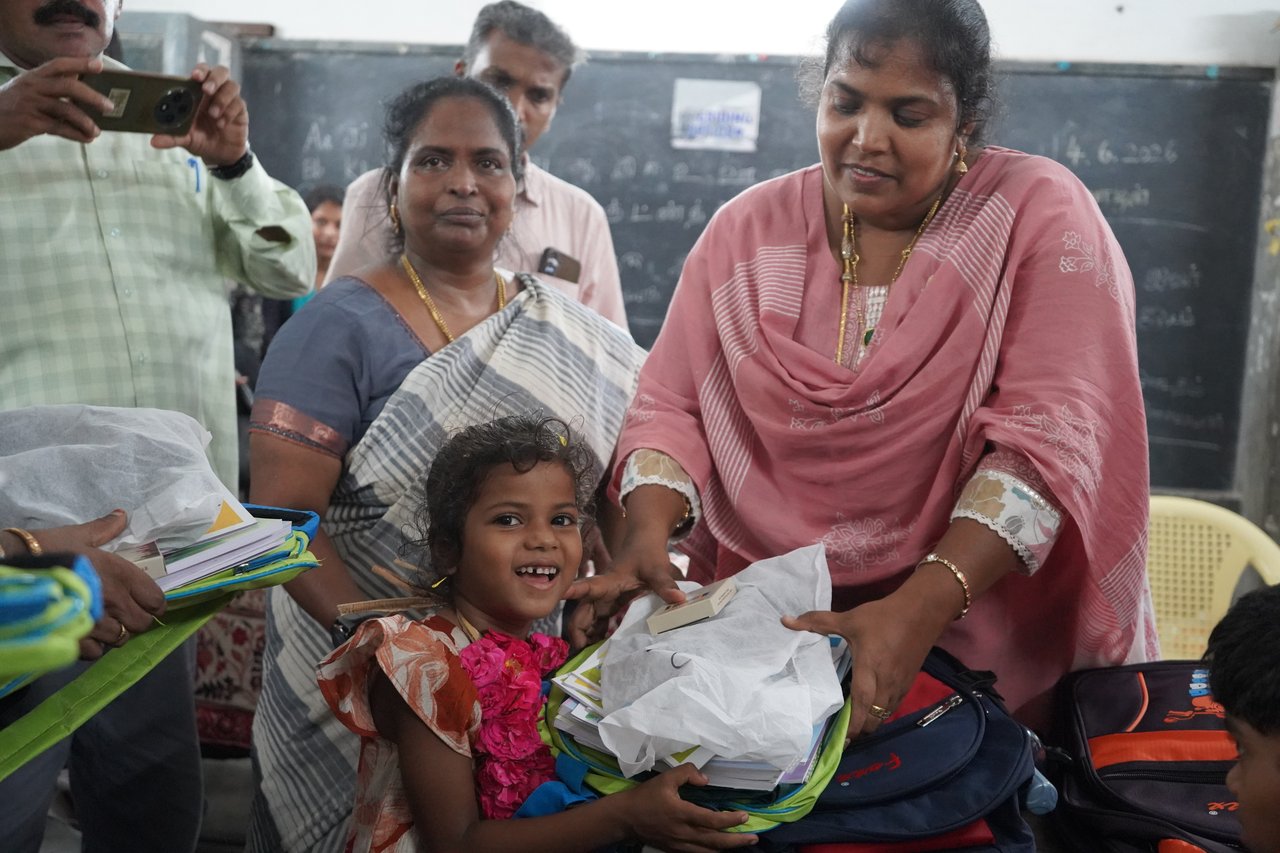 Iyappan s daughter getting school supply from DLSA secretary JPG 202608 TAN Joyful Moment Shows Survivors Trust in Local Govt Full Use