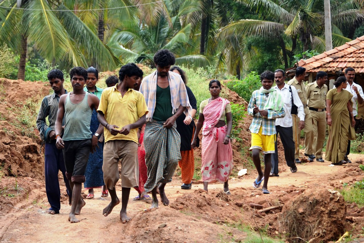 Survivors exit the brick kiln